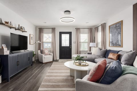 Bright, welcoming living room with comfortable seating, great for unwinding