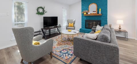 Bright + cozy living room, perfect for relaxing after a day at Zilker Park or Lady Bird Lake.