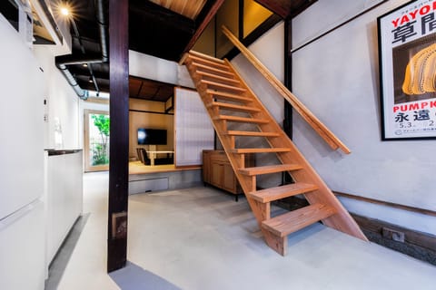City Townhome | Living area | 50-inch flat-screen TV with cable channels