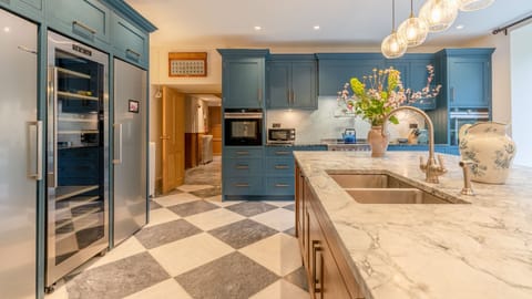 Kentchurch Court's kitchen feels warm and bright