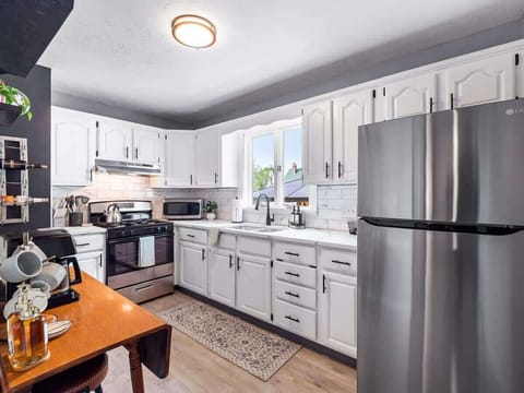 Cook your favorite meals in our fully equipped kitchen with modern appliances.