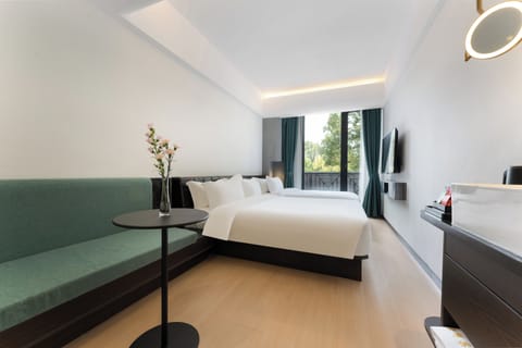Family Triple Room | Pillowtop beds, in-room safe, blackout drapes, soundproofing