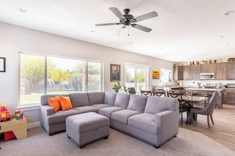 Family room, dining room, and kitchen in one shared space.