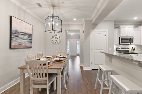 The large kitchen table is perfect for dinner with family or friends.