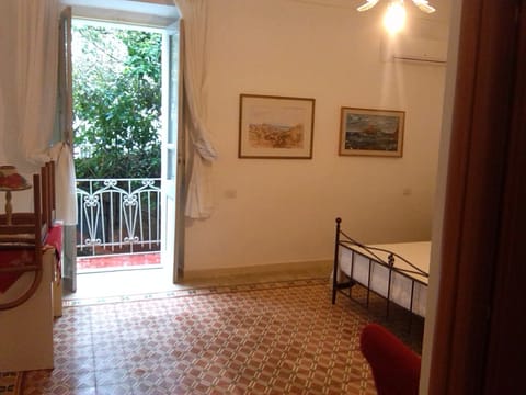 Luxury Triple Room, Balcony, Garden View | In-room safe, individually decorated, individually furnished