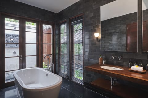 Designer toiletries, hair dryer, bathrobes, slippers