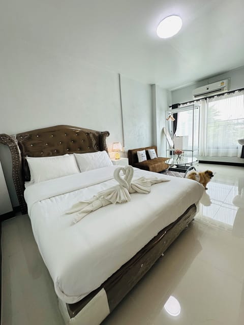 Standard Room, 1 Queen Bed, Private Bathroom, City View | Laptop workspace, blackout drapes