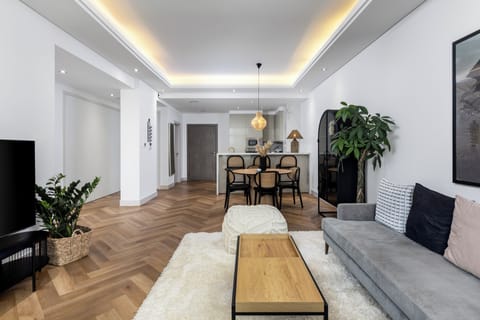 Classic Apartment, Balcony, Sea View | Living area | Flat-screen TV