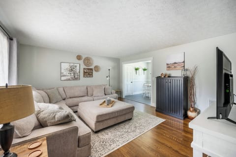 Enjoy spending time together in the living room lounging on our HUGE sectional sofa!