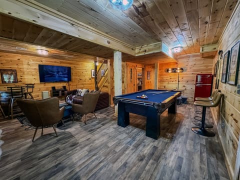 Pool table and 75" Roku TV