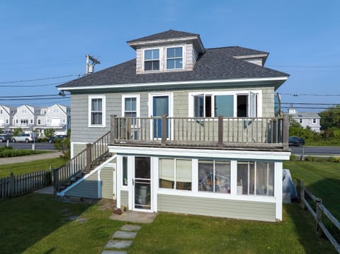 back of the building as you walk back from the beach - you apartment door will be on the front side of the building 