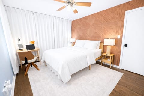 Experience ultimate comfort in our master suite. Featuring a spacious layout, modern decor, and blackout curtains for the perfect sleep environment. Your restful San Antonio stay starts right here