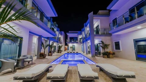 Unwind in style as our backyard haven with pool lounge chairs offers the perfect spot for relaxation and tranquility, allowing you to bask in the sun and let your worries drift away.