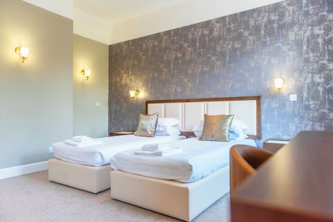 Family Room, Multiple Beds | Living area | TV