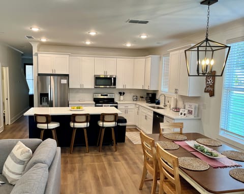 Bar area seats 3, coffee pot and single pod available