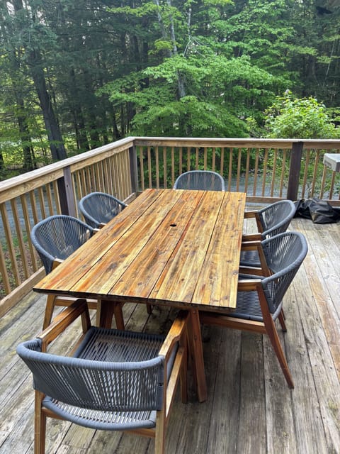 Outdoor seating for 8 on attached deck off of the great room/kitchen.