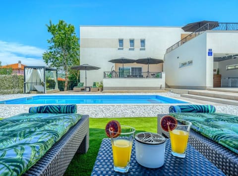 Villa (Five Bedroom Villa with Private Pool) | Outdoor pool | Outdoor pool, pool umbrellas, sun loungers