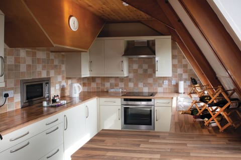 Burley Lodge | Private kitchen | Fridge, microwave, oven, stovetop