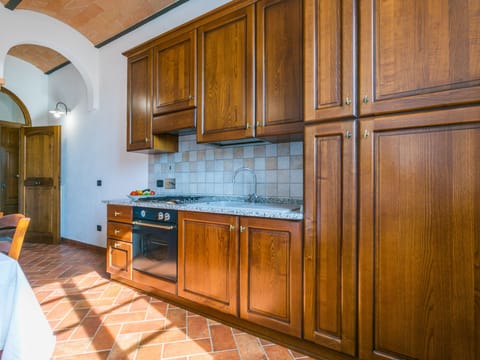 Fridge, oven, highchair, cookware/dishes/utensils