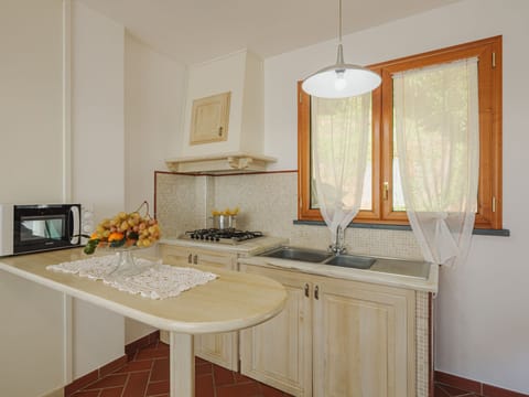 Fridge, microwave, cookware/dishes/utensils