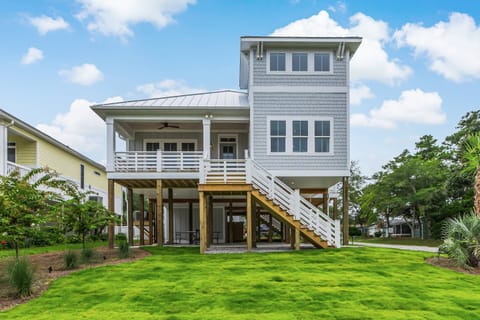 Discover The Southerly, a charming coastal retreat in Oak Island.