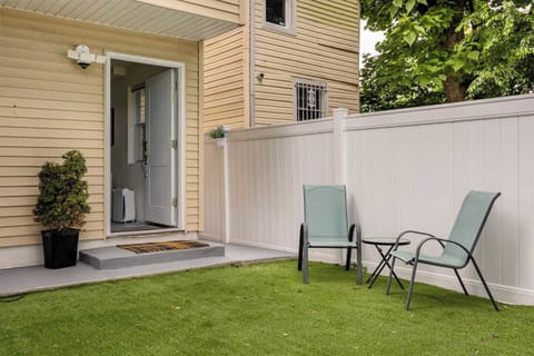 Outdoor Space: Step into a serene shared backyard, perfect for morning coffee or an evening unwind.