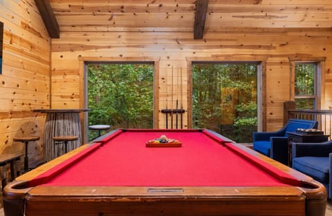 Game Room Loft: Pool table, HDTV, pub height table with stools, selection of board games, additional seating.