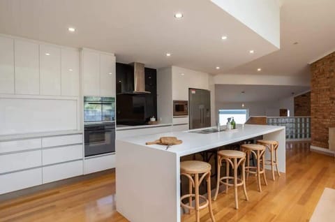 Well-appointed kitchen with two ovens and two dishwashers