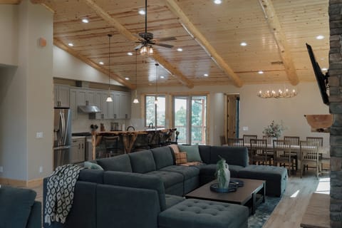 Open concept main floor with living room, dining room, and kitchen.
