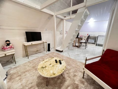 Deluxe Chalet | Living area | Flat-screen TV