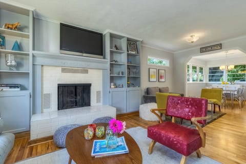 Living Room & adjacent sitting and dining room area. 