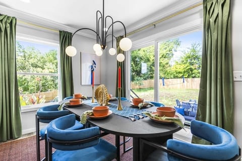 Dining are with plush seats for6 overlooking outdoor area