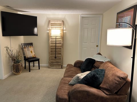 Comfortable living room with large smart tv