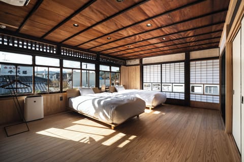 Deluxe Twin Room, Garden View | In-room safe, blackout drapes, WiFi (free), bed sheets