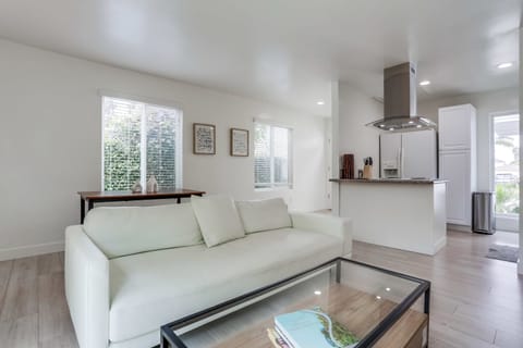 Reverse view of the living room with coffee table and sleek sofa
