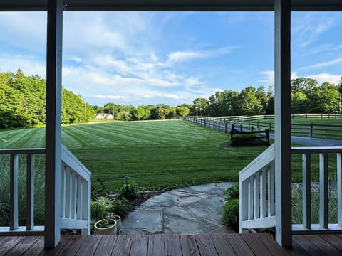 Picturesque views from the gorgeous front porch ideal for families or Purina Farm groups and large yard for doggies at Pointer Haus.