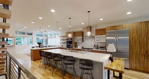 There is so much room in this beautiful kitchen. You will love having this at the center of the house
