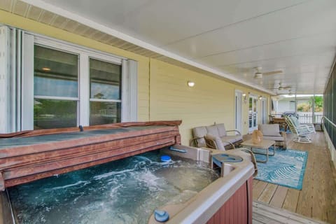 The hot tub invites you to unwind and soak your cares away, offering a relaxing retreat with soothing jets and a perfect spot to enjoy the evening under the stars.