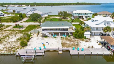 Sunny Side Up offers breathtaking waterfront views and direct access to a serene canal!