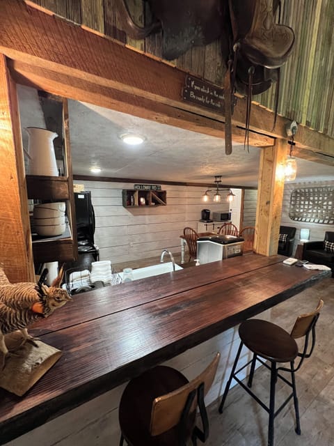 A bar that overlooks the kitchen