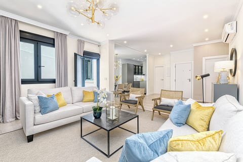 Deluxe Apartment | Living area | 50-inch LCD TV with cable channels