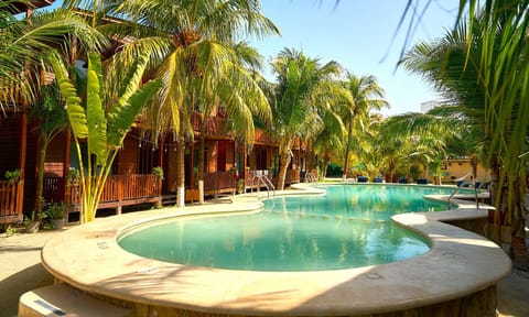 Outdoor pool, open 7:00 AM to 10:30 PM, sun loungers