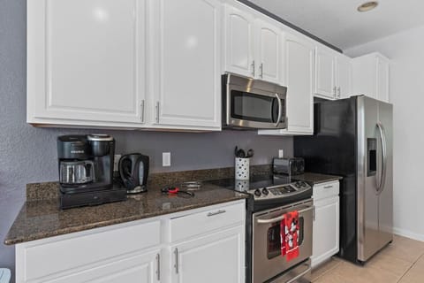 Enjoy cooking in this clean, stylish kitchen.