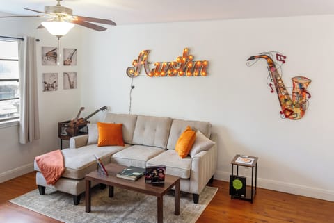 Living Room with comfy sofa and a great background for photo ops.