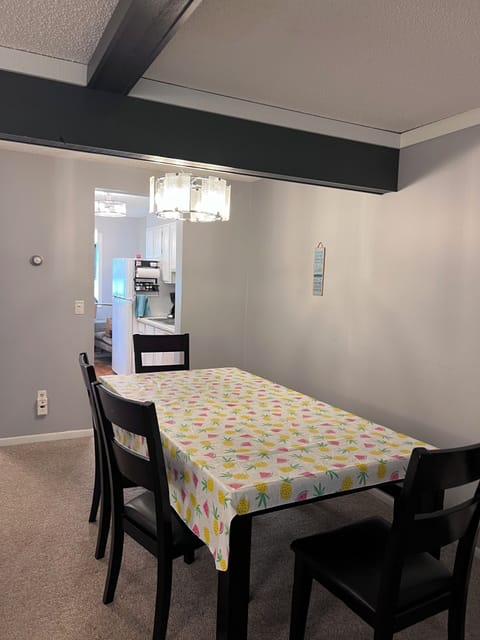 Dining area seats 6 comfortably. Extra folding chairs expands table to 8