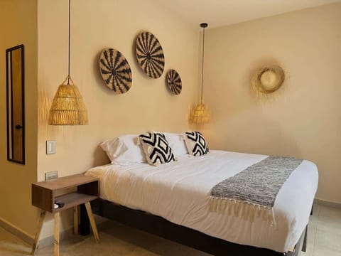 King bed with boutique decor