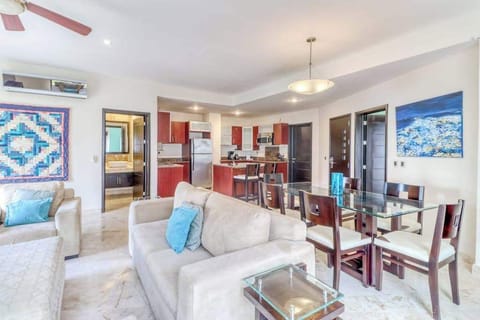 Living room with sofa and ocean-view balcony