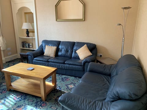 Apartment, 2 Bedrooms | Living area | 42-inch LCD TV with digital channels, books