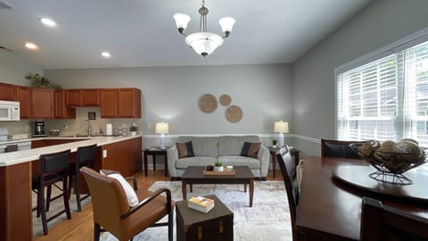Relax in our spacious living room, featuring a comfy couch and stunning views that invite you to unwind!