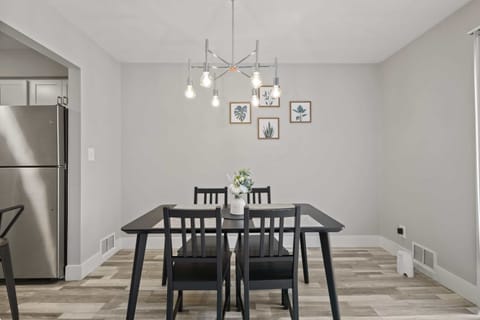 Serve your delicious meals easily at the lovely dining table.